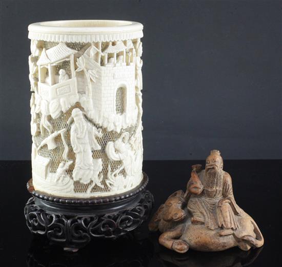 A Chinese ivory brush pot and stand and a bamboo carving, 20th century, height 9cm (2)